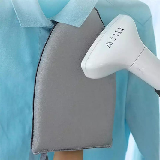 Highly insulated hand held iron pad.