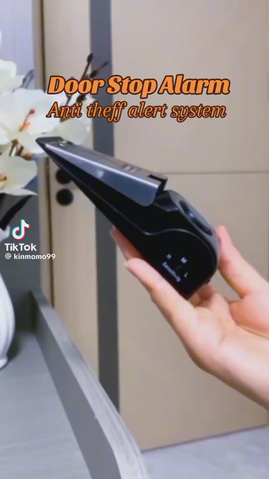 Safety door stop alarm